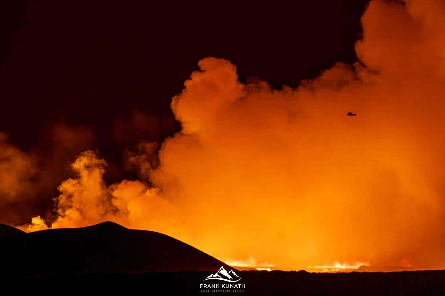 Hobbyfotografen bei der Aufnahme eines beeindruckenden Vulkanausbruch in Island